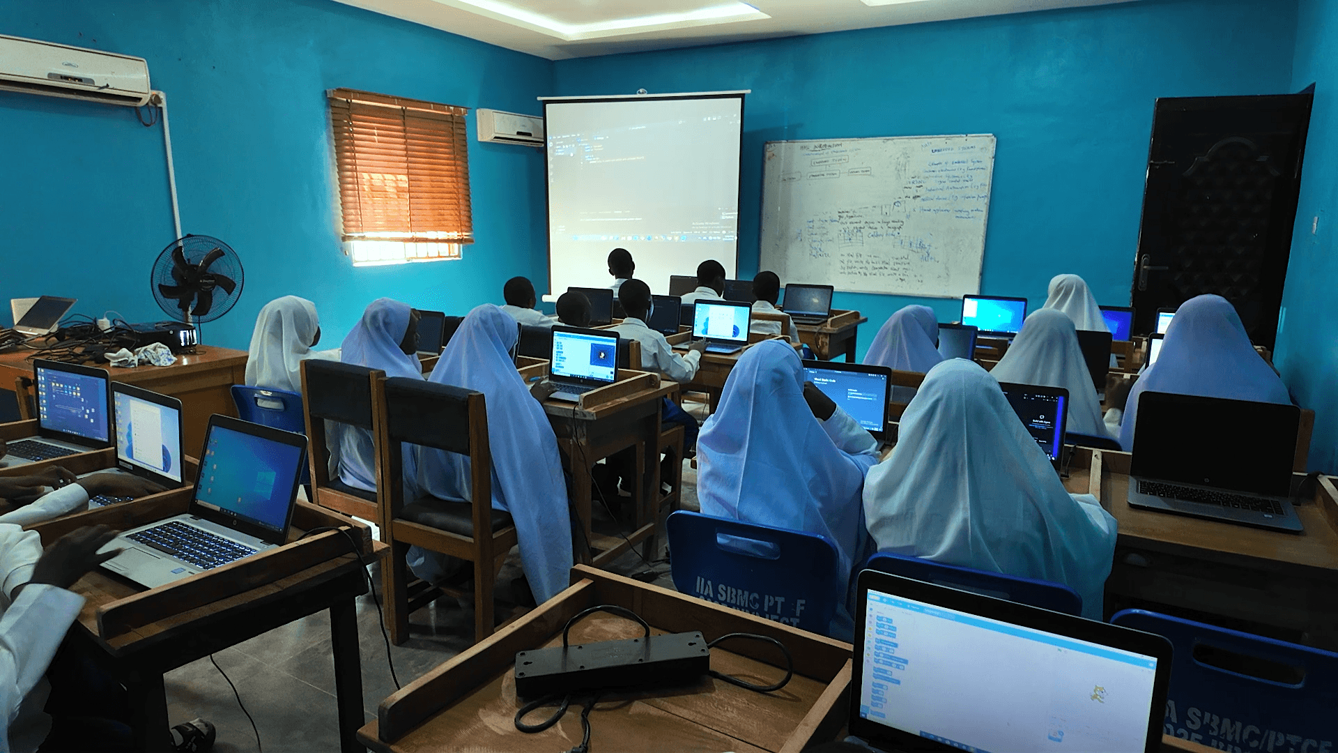 Inaayatullah students taking part in a practical computer lesson